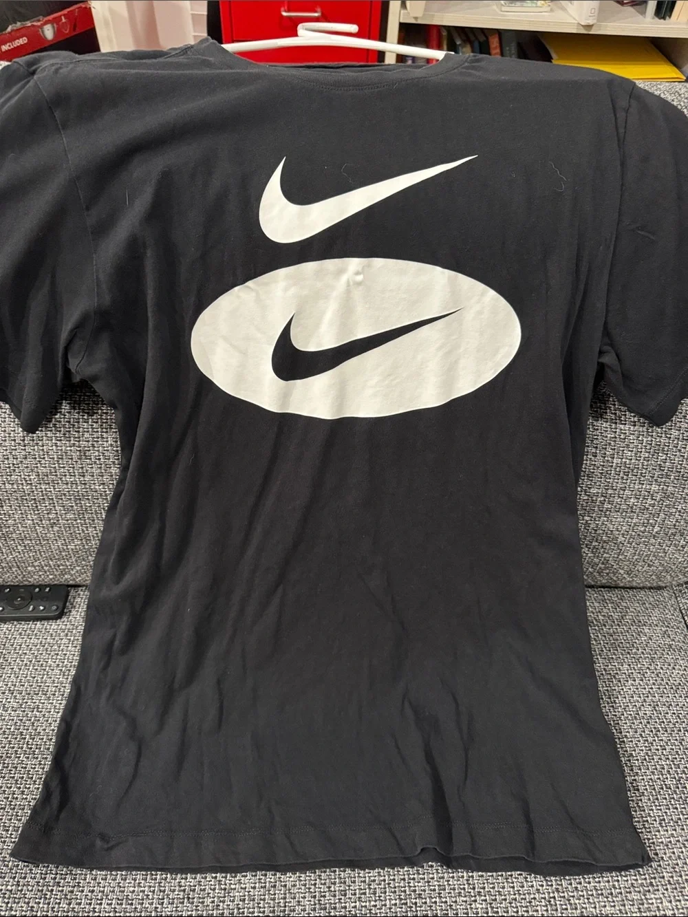 Nike Black Short-Sleeve Tee with White Swoosh Graphics